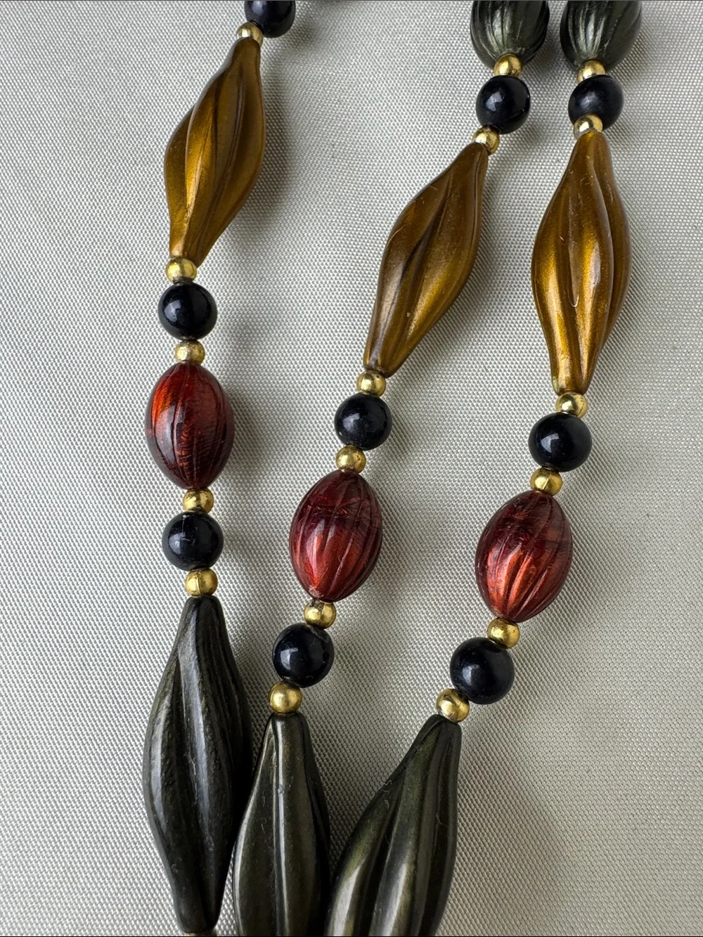 Multi-Strand Metallic Bead Necklace in Red, Gold & Black - Picture 9 of 10